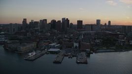 6k aerial stock footage approaching the skyline, Downtown Boston, Massachusetts, sunset Aerial Stock Footage | AX146_108E