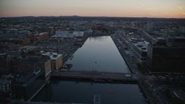 6k aerial stock footage flying over Fort Point Channel, Downtown Boston, Massachusetts, twilight Aerial Stock Footage | AX146_112
