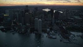 6k aerial stock footage flying by skyscrapers, Downtown Boston, Massachusetts, twilight Aerial Stock Footage | AX146_127E