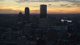 6k aerial stock footage flying by downtown buildings, skyscrapers, Downtown Boston, Massachusetts, twilight Aerial Stock Footage | AX146_137