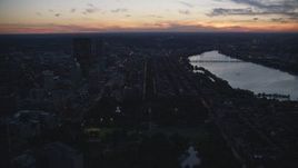 6k aerial stock footage approaching skyscrapers, Back Bay row houses, Downtown Boston, Massachusetts, twilight Aerial Stock Footage | AX146_144