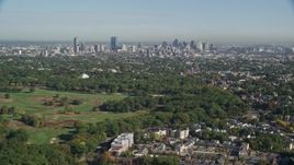 6K aerial stock footage approaching Downtown Boston city sprawl and skyline, Massachusetts Aerial Stock Footage | AX147_002