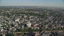 6K aerial stock footage flying over residential area and Chelsea River toward hospital, Chelsea, Massachusetts Aerial Stock Footage | AX147_010E