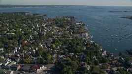 6K aerial stock footage orbiting Abbott Hall, coastal community along harbor, Marblehead, Massachusetts Aerial Stock Footage | AX147_030E