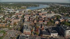 6K aerial stock footage flying over brick office and apartment buildings in autumn, Salem, Massachusetts Aerial Stock Footage | AX147_041