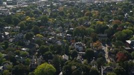 6K aerial stock footage flying over a residential neighborhood in autumn, Salem, Massachusetts Aerial Stock Footage | AX147_045E