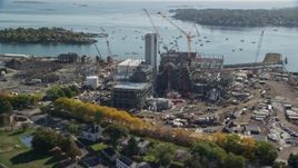 6K aerial stock footage orbiting construction at a natural gas power plant, Salem, Massachusetts Aerial Stock Footage | AX147_051