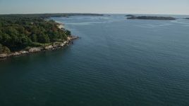 6K aerial stock footage flying over Salem Sound along coastline, Beverly, Massachusetts Aerial Stock Footage | AX147_056