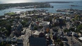 6K aerial stock footage orbiting away form a city hall in a coastal town, Gloucester, Massachusetts Aerial Stock Footage | AX147_101E