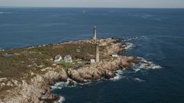 6K aerial stock footage approaching an island with two lighthouses, Thatcher Island, Massachusetts Aerial Stock Footage | AX147_109E