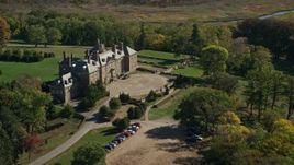 6K aerial stock footage orbiting The Great House at Crane Estate on Castle Hill in autumn, Ipswich, Massachusetts Aerial Stock Footage | AX147_144E