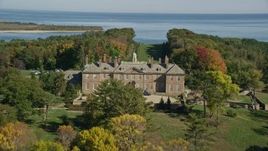 6K aerial stock footage approaching The Great House at Crane Estate in autumn, Castle Hill, Ipswich, Massachusetts Aerial Stock Footage | AX147_147E