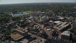 6K aerial stock footage orbiting a coastal community with fall foliage, autumn, Portsmouth, New Hampshire Aerial Stock Footage | AX147_175E