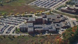 6K aerial stock footage flying by Portsmouth Regional Hospital, autumn, Portsmouth, New Hampshire Aerial Stock Footage | AX147_207