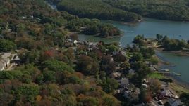 6k aerial stock footage flying by waterfronts homes, colorful autumn trees, Kittery, Maine Aerial Stock Footage | AX147_227
