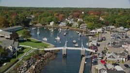 6K aerial stock footage approaching oceanfront homes, small bridge, harbor, autumn, Ogunquit, Maine Aerial Stock Footage | AX147_249E