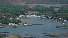 6k aerial stock footage flying by waterfront homes, small cove, autumn, Kennebunkport, Maine Aerial Stock Footage | AX147_259