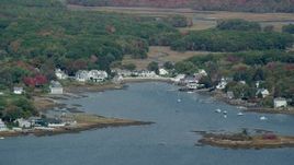 6k aerial stock footage flying by waterfront homes, small cove, colorful trees, autumn, Kennebunkport, Maine Aerial Stock Footage | AX147_260