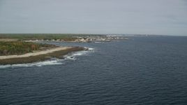 6K aerial stock footage flying by the coastline, approaching coastal town, Biddeford, Maine Aerial Stock Footage | AX147_263E