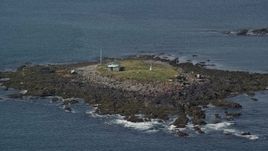 6K aerial stock footage approaching Ram Island, rocky shore, Saco, Maine Aerial Stock Footage | AX147_272