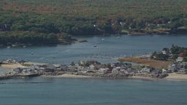 6K aerial stock footage approaching oceanfront homes, Saco River, autumn, Saco, Maine Aerial Stock Footage | AX147_273E