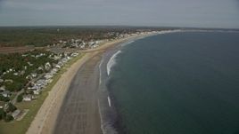 6K aerial stock footage flying by a beach and coastal town, autumn, Old Orchard Beach, Maine Aerial Stock Footage | AX147_294