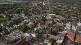 6k aerial stock footage flying by neighborhood, autumn, Portland, Maine Aerial Stock Footage | AX147_336
