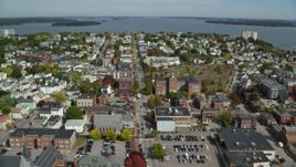 6k aerial stock footage flying over a neighborhood approaching a coastal town, Portland, Maine Aerial Stock Footage | AX147_340