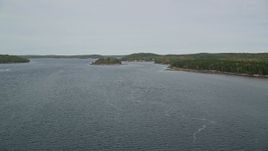 6K aerial stock footage flying over Kennebec River, approach Perkins Island, Marr Island, Georgetown, Maine Aerial Stock Footage | AX147_399E