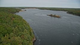 6K aerial stock footage flying over forest, Kennebec River, approach Ram Island, autumn, Phippsburg, Maine Aerial Stock Footage | AX147_405E