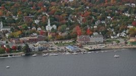 6K aerial stock footage flying by small waterfront town, church, autumn, Bath, Maine Aerial Stock Footage | AX147_414