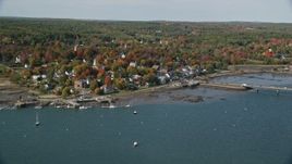 6K aerial stock footage flying over Sheepscot River, approaching small town, autumn, Wiscasset, Maine Aerial Stock Footage | AX148_003E