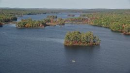 6k aerial stock footage of forests on small islands, Pemaquid Pond, McCurdy Pond, autumn, Damariscotta, Maine Aerial Stock Footage | AX148_025
