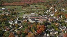 6K aerial stock footage flying by a small town, colorful trees, autumn, Thomaston, Maine Aerial Stock Footage | AX148_072