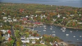 6K aerial stock footage orbiting small coastal town, Rockport Harbor, autumn, Rockport, Maine Aerial Stock Footage | AX148_098E