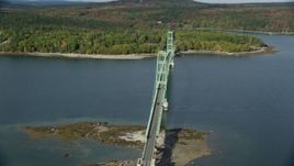 6k aerial stock footage orbiting the Deer Isle Bridge in autumn, Deer Isle Bridge, Maine Aerial Stock Footage | AX148_139