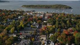 5.5K aerial stock footage flying toward harbor over Main Street in coastal town, autumn, Bar Harbor, Maine Aerial Stock Footage | AX148_206E