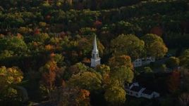 5.5K aerial stock footage orbiting church steeple in a small town with fall foliage, Blue Hill, Maine Aerial Stock Footage | AX149_028