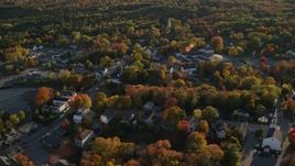 5.5K aerial stock footage flying over small coastal town homes and streets in autumn, Blue Hill, Maine Aerial Stock Footage | AX149_033