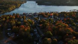 5.5K aerial stock footage orbiting a small coastal town on the Penobscot River, autumn, Bucksport, Maine Aerial Stock Footage | AX149_106