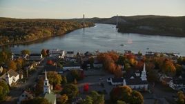 5.5K aerial stock footage approaching Penobscot Narrows Bridge from over small town, autumn, Bucksport, Maine Aerial Stock Footage | AX149_111E