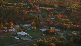 5.5K aerial stock footage orbiting church in a small rural town, autumn, Searsmont, Maine, sunset Aerial Stock Footage | AX149_182