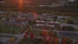 5.5K aerial stock footage orbiting Maine government offices, colorful trees, autumn, Augusta, Maine, twilight Aerial Stock Footage | AX149_230E