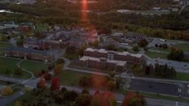 5.5K aerial stock footage orbiting green lawns, Maine government buildings in autumn, Augusta, Maine, twilight Aerial Stock Footage | AX149_232