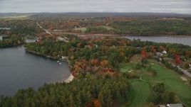 5.5K aerial stock footage flying over the Augusta Golf Course, following Western Avenue, autumn, Manchester, Maine Aerial Stock Footage | AX150_005E