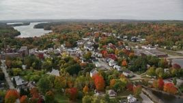 5.5K aerial stock footage flying over small town, homes, factory, roads, autumn, Winthrop, Maine Aerial Stock Footage | AX150_020E