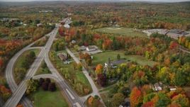 5.5K aerial stock footage flying by rural homes near Route 11, Western Avenue, autumn, Winthrop, Maine Aerial Stock Footage | AX150_023