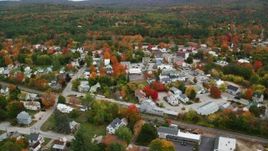 5.5K aerial stock footage orbiting small rural town with colorful trees, autumn, Paris, Maine Aerial Stock Footage | AX150_086