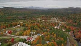 5.5K aerial stock footage flying by small rural town, Valley Road, autumn, overcast, Waterford, Maine Aerial Stock Footage | AX150_122E