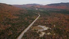 5.5K aerial stock footage flying over forest, Highway 302, autumn, overcast, White Mountains, New Hampshire Aerial Stock Footage | AX150_201